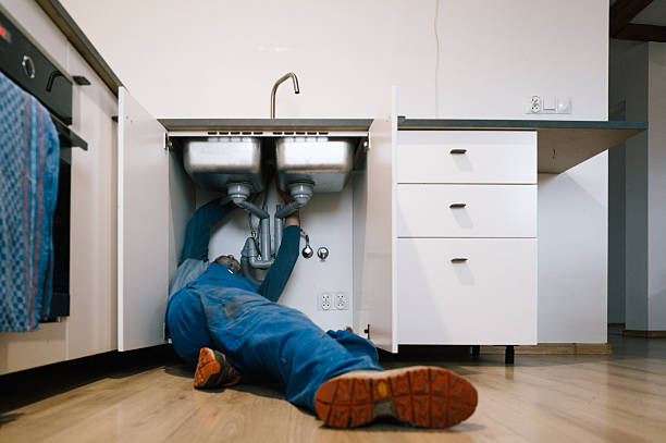 Professional Drain Cleaning technician working in Sparta, GA